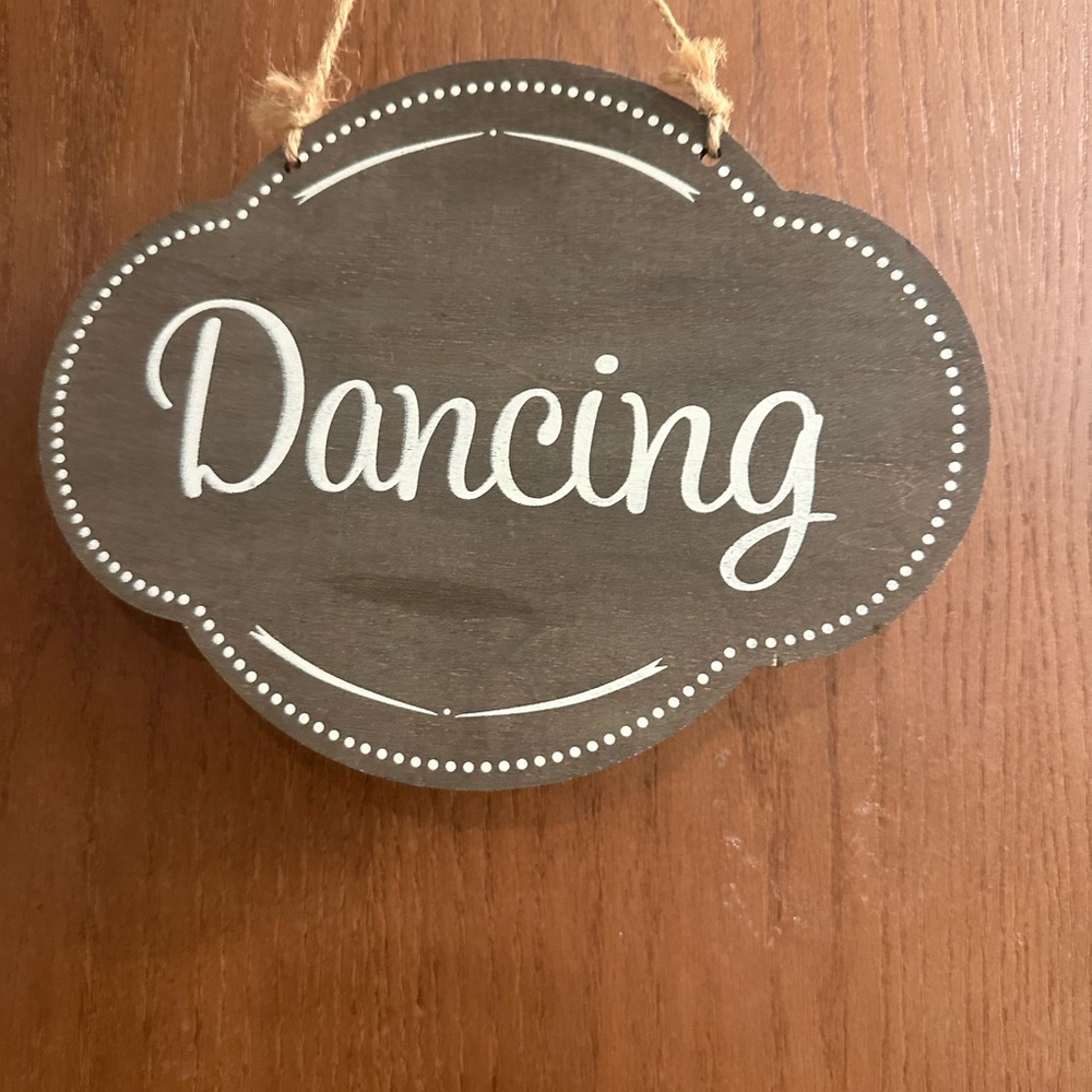 Brown Wooden Dancing Sign
